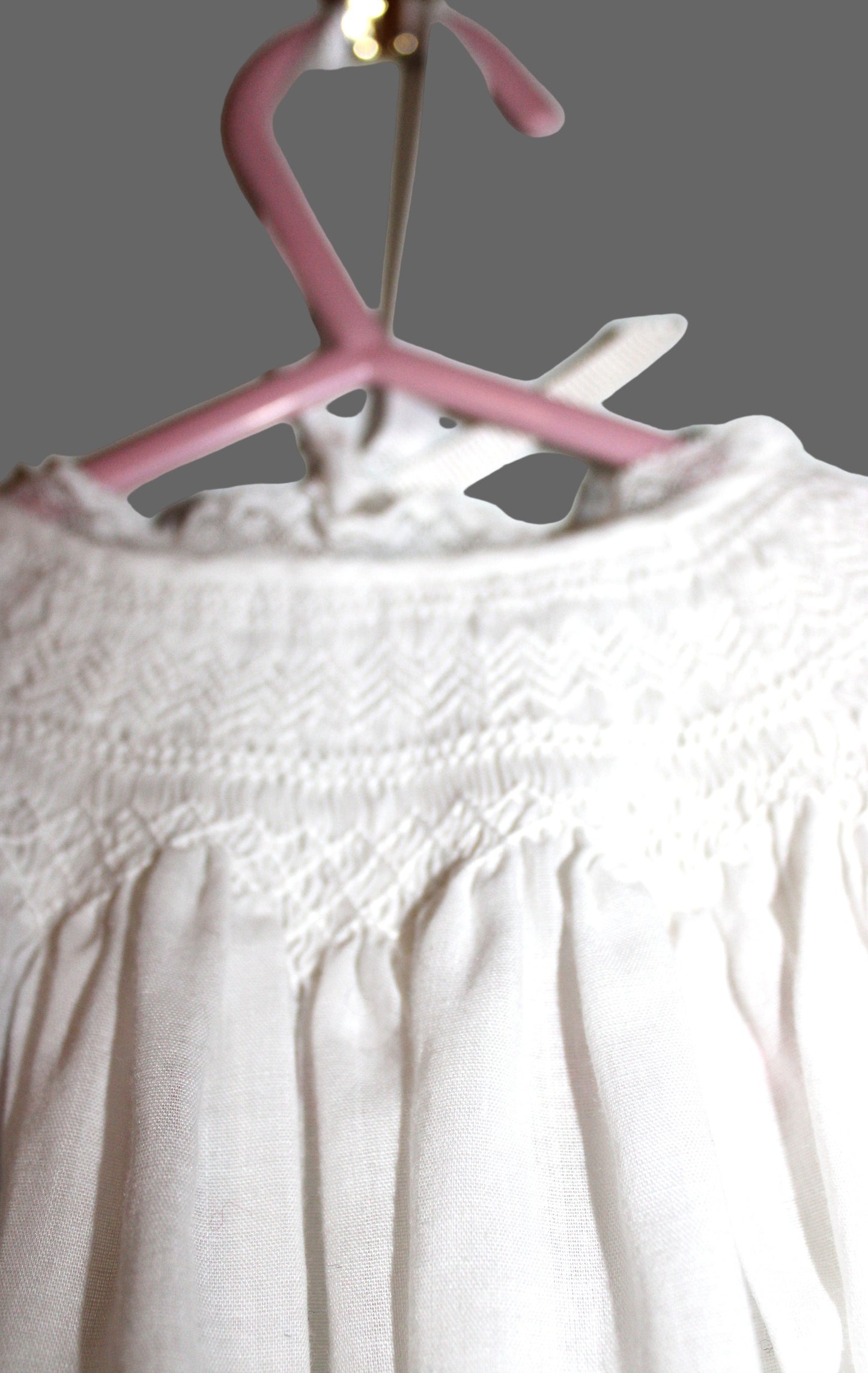 Baby's white embroidered christening robe