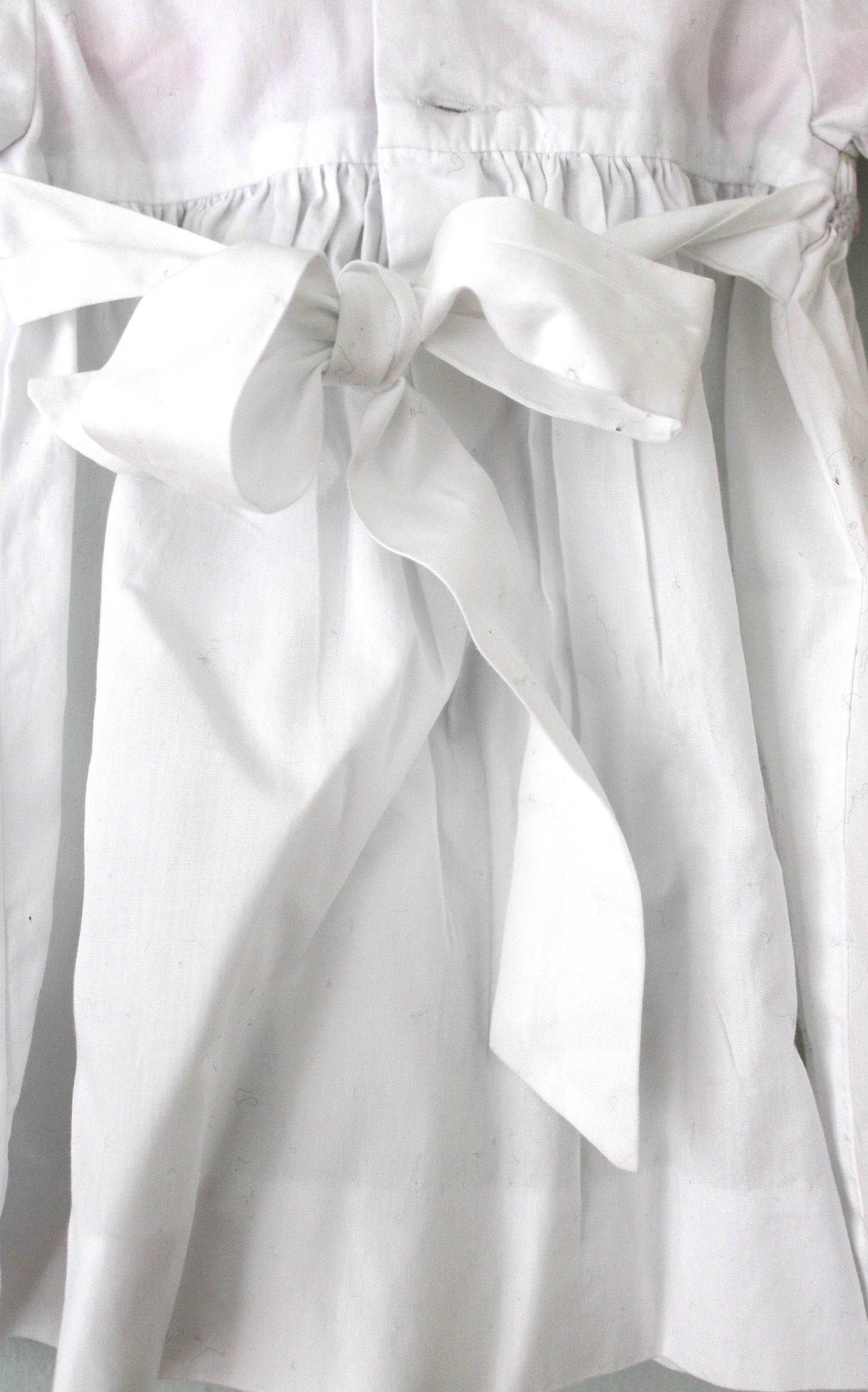 Meleze white smocked baby's dress