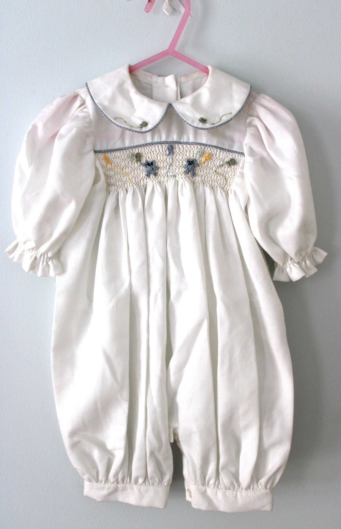Squibbles Baby's smocked romper suit