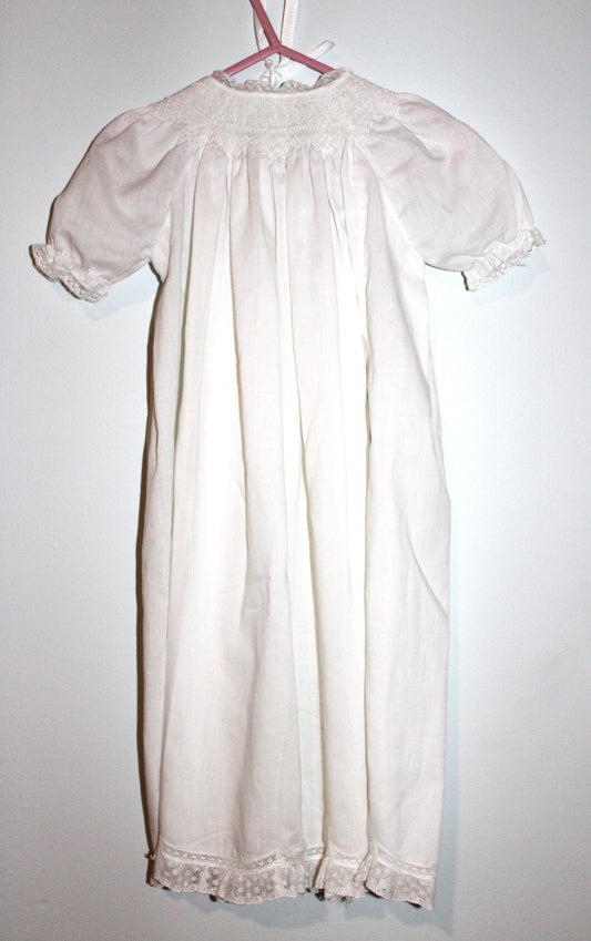 Baby's white embroidered christening robe