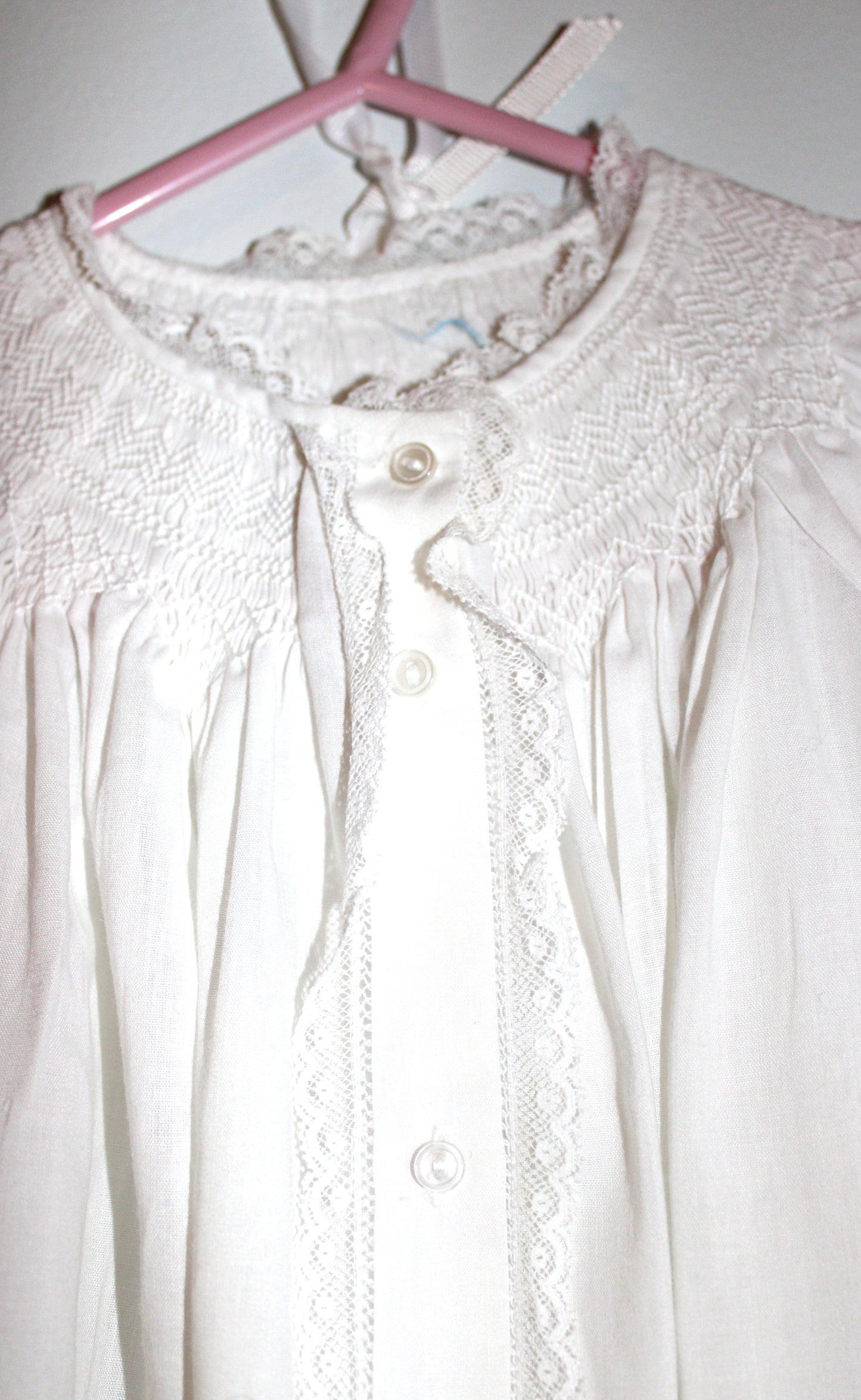 Baby's white embroidered christening robe