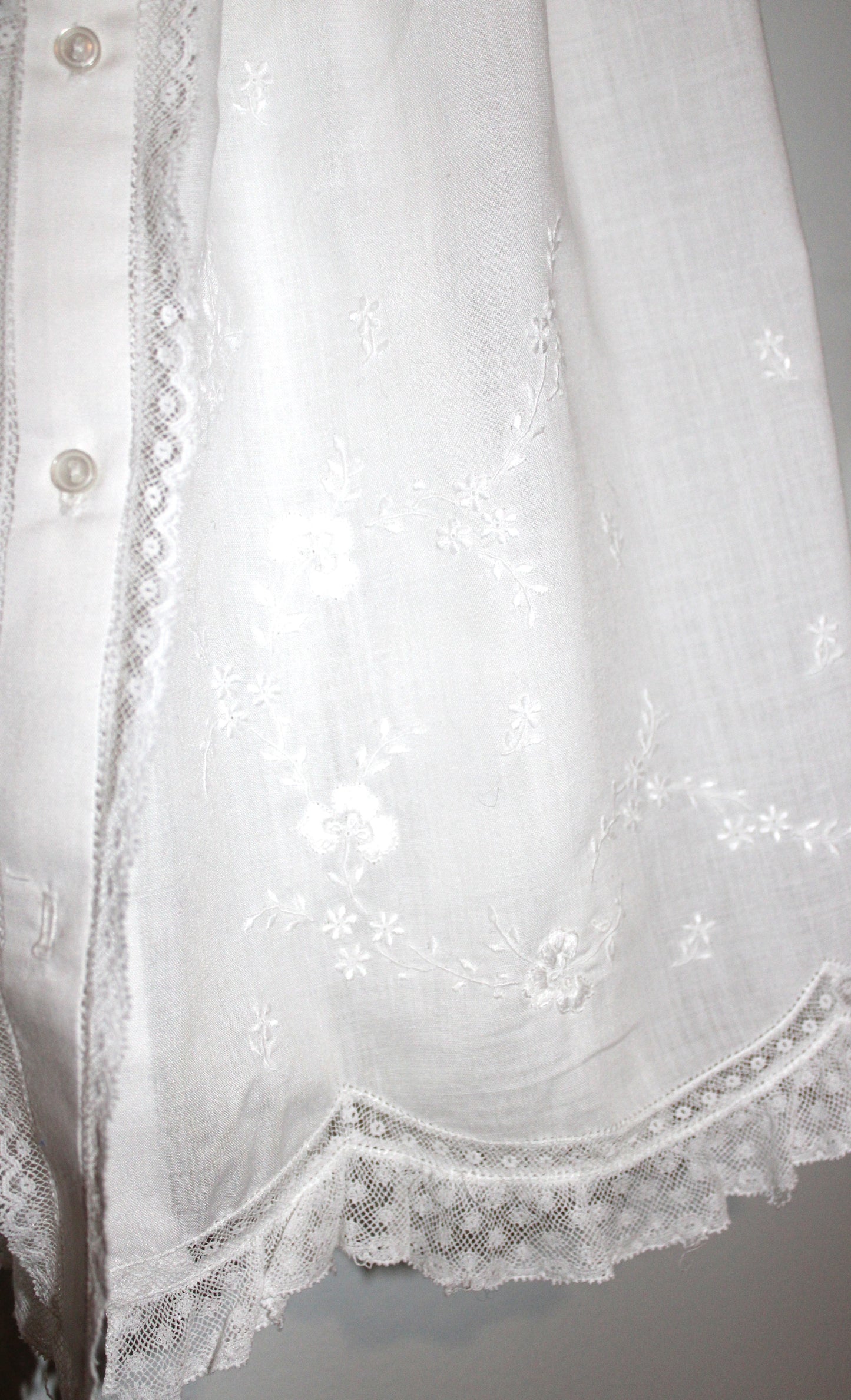 Baby's white embroidered christening robe