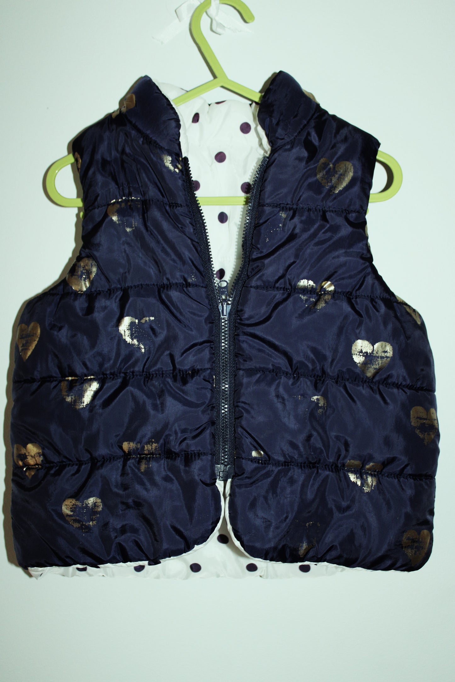 Navy heart patterned puffer vest