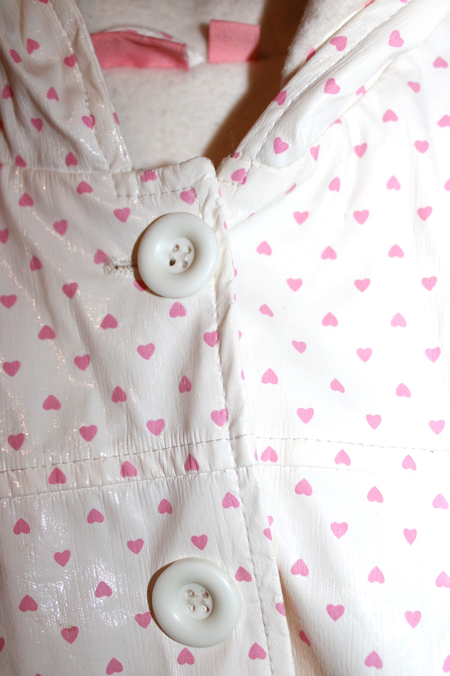 Sugar Possum pink & white patterned raincoat