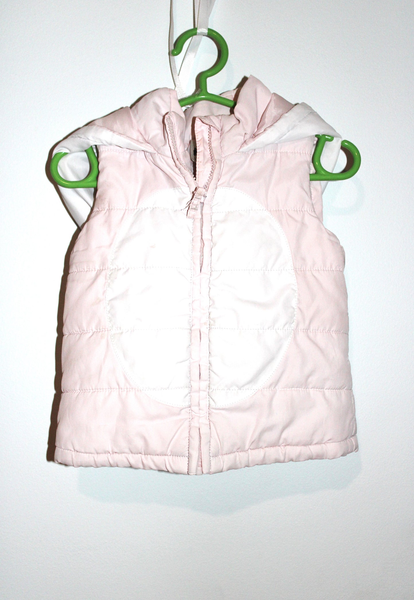 Padded pink baby's hooded vest